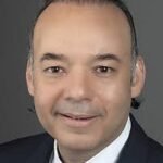 Dr. Joseph E. August