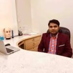 Dr. Madan J