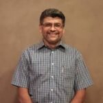Dr. Tushar Shah