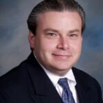 Dr. David E. Auer, MD