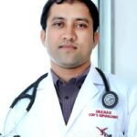 Dr. E. Ravi