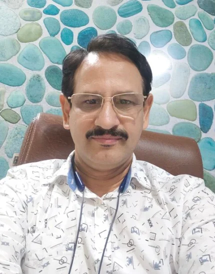 Dr. Saju George